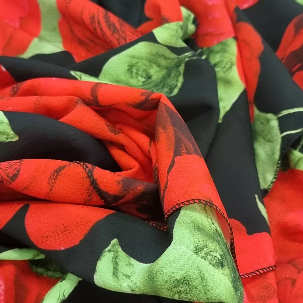Elle Carina punakukkainen mekko musta